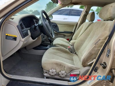 Zdjęcie 7 z 12 samochodu: 2003 HYUNDAI ELANTRA GLS VIN:KMHDN45D83U473840 - miniatura