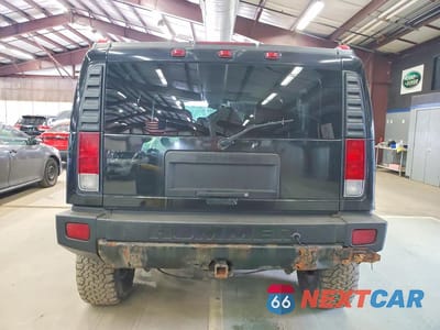 Zdjęcie 6 z 13 samochodu: 2006 HUMMER H2 VIN:5GRGN23U06H119962 - miniatura