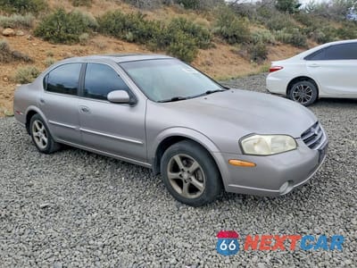 Czwarte zdjęcie samochodu z boku: 2000 NISSAN MAXIMA GXE VIN:JN1CA31A5YT204700 - miniatura