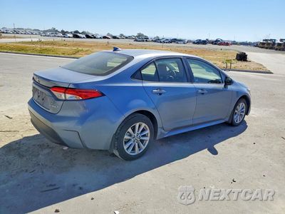 Trzecie zdjęcie samochodu z tyłu: 2024 TOYOTA COROLLA HYBRID LE VIN:JTDBCMFE0RJ022629 - miniatura