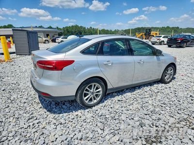 Trzecie zdjęcie samochodu z tyłu: 2018 FORD FOCUS SE VIN:1FADP3F22JL250398 - miniatura