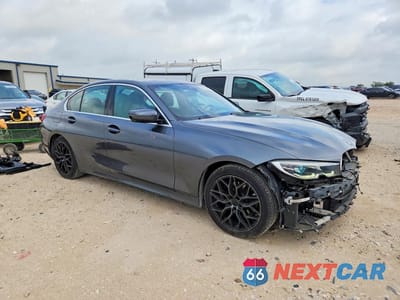 Czwarte zdjęcie samochodu z boku: 2020 BMW 330I VIN:3MW5R1J0XL8B42492 - miniatura