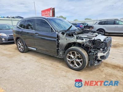 Czwarte zdjęcie samochodu z boku: 2022 BMW X3 XDRIVE30I VIN:5UX53DP00N9J57524 - miniatura