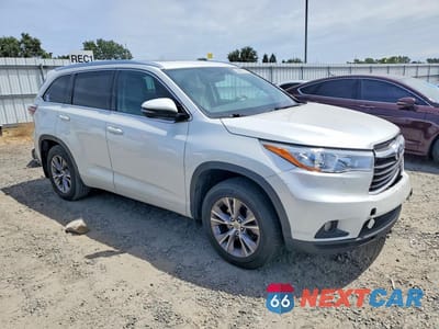 Czwarte zdjęcie samochodu z boku: 2015 TOYOTA HIGHLANDER XLE VIN:5TDJKRFHXFS181212 - miniatura