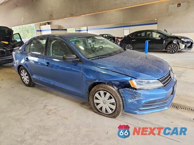 Czwarte zdjęcie samochodu z boku: 2016 VOLKSWAGEN JETTA S VIN:3VW267AJ7GM254929 - miniatura