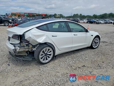 Trzecie zdjęcie samochodu z tyłu: 2023 TESLA MODEL 3 VIN:5YJ3E1EA0PF671640 - miniatura