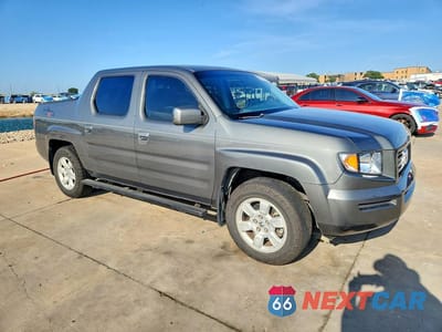 Czwarte zdjęcie samochodu z boku: 2007 HONDA RIDGELINE RTL VIN:2HJYK16537H510382 - miniatura