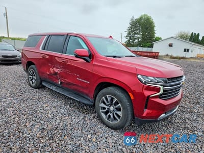Czwarte zdjęcie samochodu z boku: 2021 CHEVROLET SUBURBAN K1500 LT VIN:1GNSKCKD7MR306707 - miniatura
