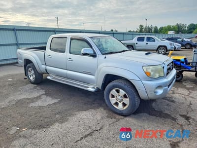Czwarte zdjęcie samochodu z boku: 2007 TOYOTA TACOMA DOUBLE CAB LONG BED VIN:5TEMU52N17Z339257 - miniatura