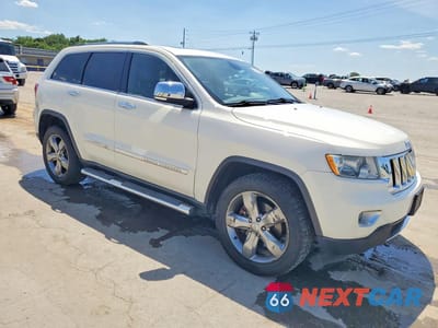 Czwarte zdjęcie samochodu z boku: 2012 JEEP GRAND CHEROKEE OVERLAND VIN:1C4RJFCT2CC116638 - miniatura