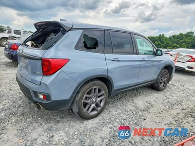 Trzecie zdjęcie samochodu z tyłu: 2023 HONDA PASSPORT EXL VIN:5FNYF8H57PB019253 - miniatura