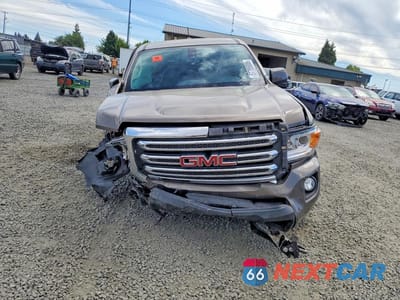 Piąte zdjęcie samochodu w środku: 2016 GMC CANYON SLE VIN:1GTG6CE3XG1188581 - miniatura