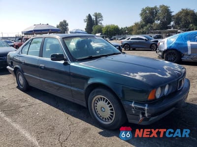 Czwarte zdjęcie samochodu z boku: 1994 BMW 525 I AUTOMATIC VIN:WBAHD6320RGK43798 - miniatura