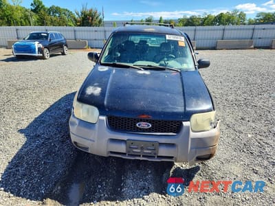Piąte zdjęcie samochodu w środku: 2001 FORD ESCAPE XLS VIN:1FMYU021X1KF11942 - miniatura