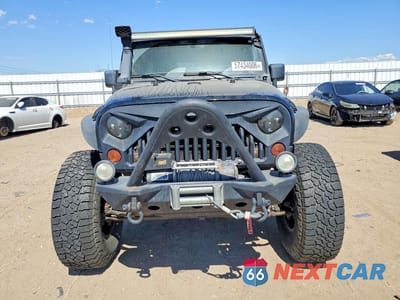 Piąte zdjęcie samochodu w środku: 2012 JEEP WRANGLER UNLIMITED RUBICON VIN:1C4BJWFGXCL178580 - miniatura
