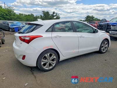 Trzecie zdjęcie samochodu z tyłu: 2013 HYUNDAI ELANTRA GT BASE VIN:KMHD35LE4DU129625 - miniatura