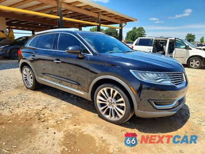 Czwarte zdjęcie samochodu z boku: 2016 LINCOLN MKX RESERVE VIN:2LMPJ6LP3GBL41859 - miniatura