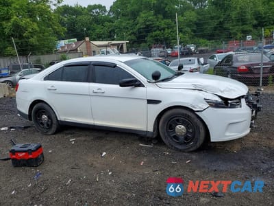 Czwarte zdjęcie samochodu z boku: 2014 FORD TAURUS POLICE INTERCEPTOR VIN:1FAHP2MKXEG180291 - miniatura