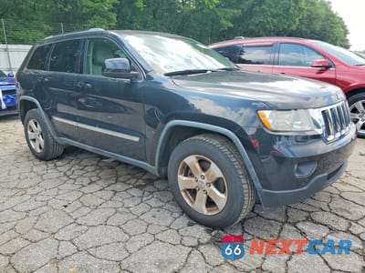 Czwarte zdjęcie samochodu z boku: 2011 JEEP GRAND CHEROKEE LAREDO VIN:1J4RS4GG7BC704283 - miniatura