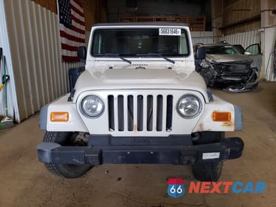 Piąte zdjęcie samochodu w środku: 2004 JEEP WRANGLER VIN:1J4FA29104P787120 - miniatura