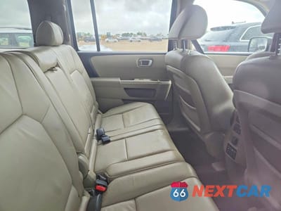 Zdjęcie 11 z 13 samochodu: 2010 HONDA PILOT EXL VIN:5FNYF4H63AB014849 - miniatura