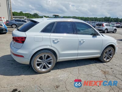 Trzecie zdjęcie samochodu z tyłu: 2015 AUDI Q3 VIN:WA1GFCFS5FR007693 - miniatura