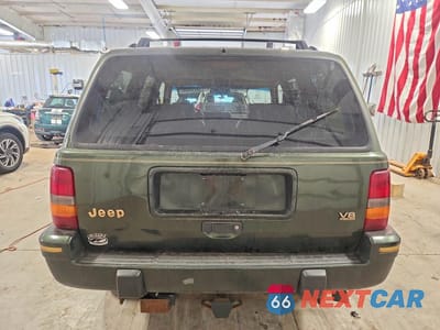 Zdjęcie 6 z 13 samochodu: 1995 JEEP GRAND CHEROKEE LIMITED VIN:1J4GZ78Y0SC528561 - miniatura