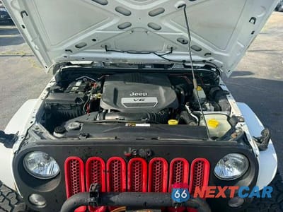 Zdjęcie 8 z 10 samochodu: 2014 JEEP WRANGLER UNLIMITED SPORT VIN:1C4BJWDG7EL203909 - miniatura