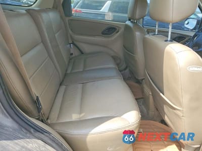 Zdjęcie 11 z 13 samochodu: 2003 FORD ESCAPE LIMITED VIN:1FMCU94193KE08316 - miniatura