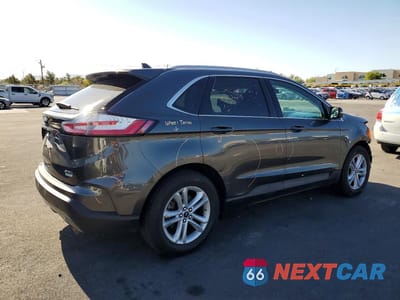 Trzecie zdjęcie samochodu z tyłu: 2020 FORD EDGE SEL VIN:2FMPK3J98LBB16455 - miniatura