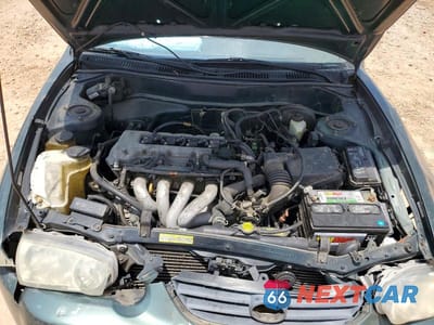 Zdjęcie 11 z 12 samochodu: 2001 TOYOTA COROLLA LE VIN:1NXBR12E21Z484577 - miniatura