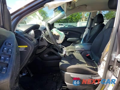 Zdjęcie 7 z 13 samochodu: 2014 HYUNDAI TUCSON GLS VIN:KM8JTCAF0EU940763 - miniatura
