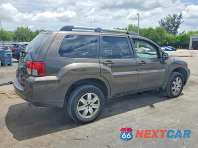 Trzecie zdjęcie samochodu z tyłu: 2011 MITSUBISHI ENDEAVOR LS VIN:4A4JN2AS8BE035899 - miniatura