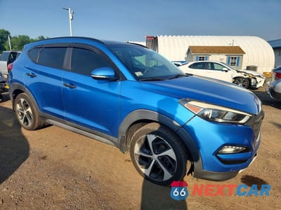 Czwarte zdjęcie samochodu z boku: 2017 HYUNDAI TUCSON LIMITED VIN:KM8J3CA22HU305268 - miniatura