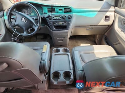 Zdjęcie 8 z 13 samochodu: 2004 HONDA ODYSSEY EXL VIN:2HKRL18984H500004 - miniatura