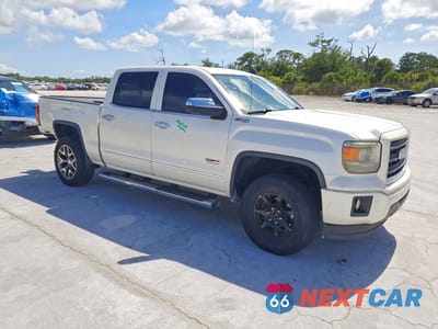 Czwarte zdjęcie samochodu z boku: 2015 GMC SIERRA K1500 SLT VIN:3GTU2VEC4FG409490 - miniatura