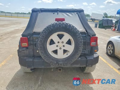 Zdjęcie 6 z 13 samochodu: 2010 JEEP WRANGLER UNLIMITED SAHARA VIN:1J4HA5H13AL198349 - miniatura