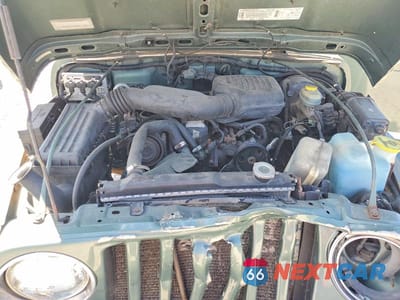Zdjęcie 12 z 13 samochodu: 1999 JEEP WRANGLER / TJ SE VIN:1J4FY29PXXP436266 - miniatura