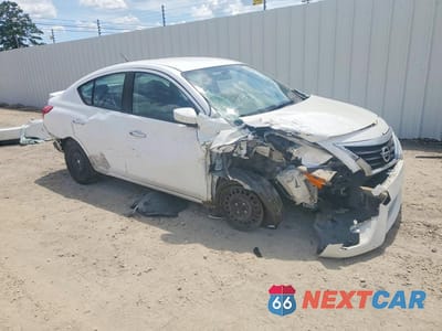 Czwarte zdjęcie samochodu z boku: 2017 NISSAN VERSA 1.6 SV VIN:3N1CN7AP5HK412988 - miniatura