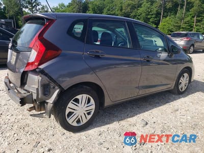 Trzecie zdjęcie samochodu z tyłu: 2019 HONDA FIT LX VIN:3HGGK5H42KM739420 - miniatura