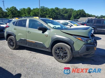 Czwarte zdjęcie samochodu z boku: 2024 SUBARU CROSSTREK WILDERNESS VIN:4S4GUHU68R3778053 - miniatura