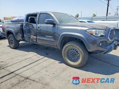 Czwarte zdjęcie samochodu z boku: 2019 TOYOTA TACOMA TRD OFF-ROAD VIN:3TMDZ5BN2KM059189 - miniatura