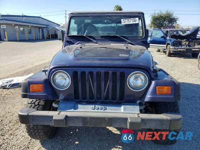 Piąte zdjęcie samochodu w środku: 1999 JEEP WRANGLER VIN:1J4FY29P2XP472503 - miniatura