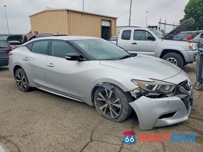 Czwarte zdjęcie samochodu z boku: 2017 NISSAN MAXIMA 3.5 SV VIN:1N4AA6AP4HC427875 - miniatura