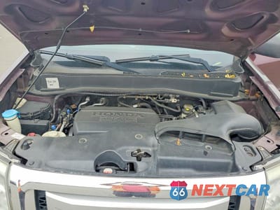 Zdjęcie 12 z 14 samochodu: 2011 HONDA PILOT EXL VIN:5FNYF4H64BB015493 - miniatura