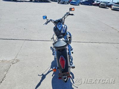 Czwarte zdjęcie samochodu z boku: 2006 HONDA VT1300 S VIN:1HFSC52036A301705 - miniatura