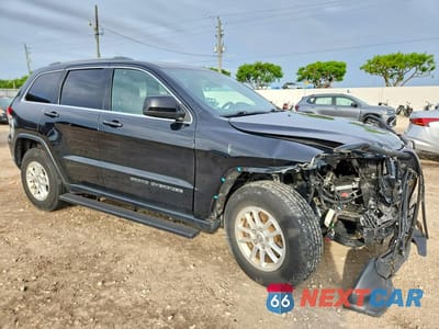 Czwarte zdjęcie samochodu z boku: 2019 JEEP GRAND CHEROKEE LAREDO VIN:1C4RJEAGXKC819712 - miniatura