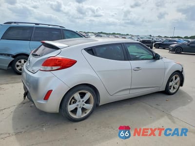 Trzecie zdjęcie samochodu z tyłu: 2013 HYUNDAI VELOSTER BASE VIN:KMHTC6AD0DU117838 - miniatura