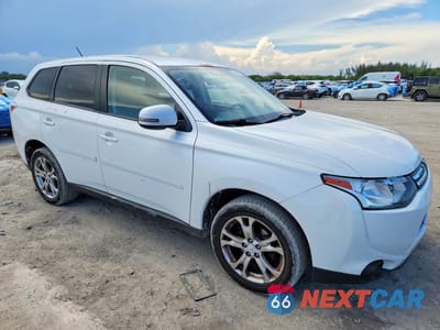 Czwarte zdjęcie samochodu z boku: 2014 MITSUBISHI OUTLANDER SE VIN:JA4AD3A33EZ015852 - miniatura
