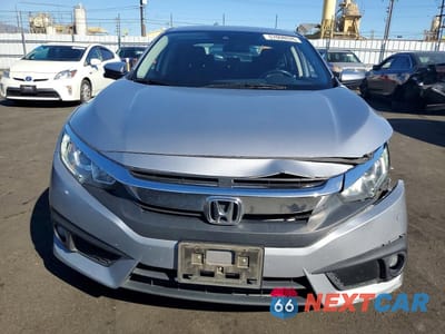 Piąte zdjęcie samochodu w środku: 2018 HONDA CIVIC EX VIN:JHMFC1F40JX013033 - miniatura